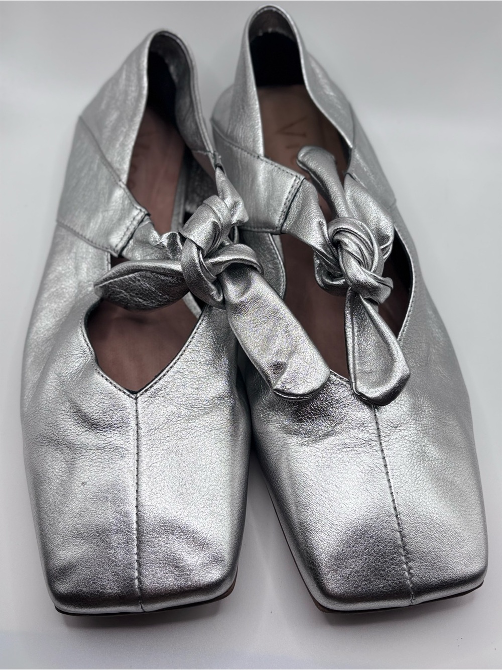 Vicenza Bow Mary Jane Flats in a metallic silver finish